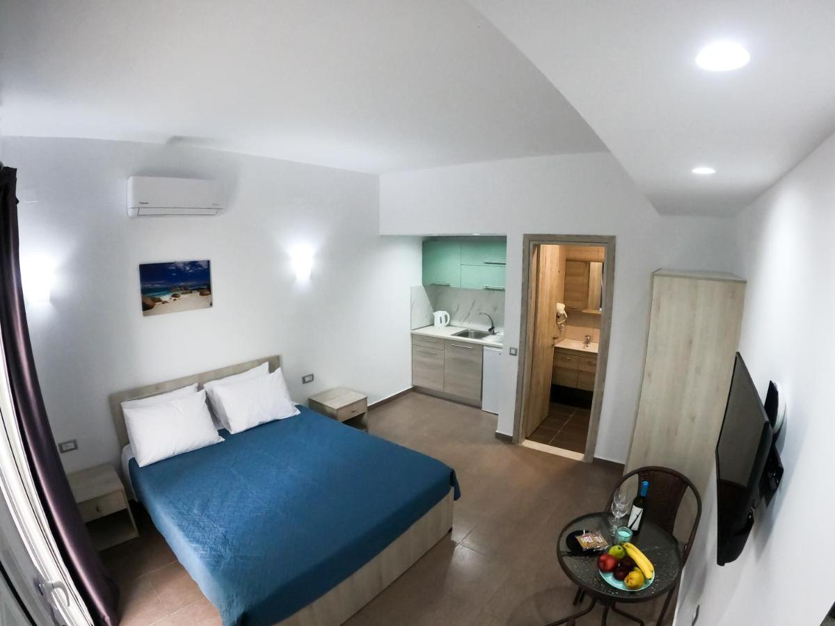 Red Hibiscus Stegna Guest House Archangelos  Exterior foto