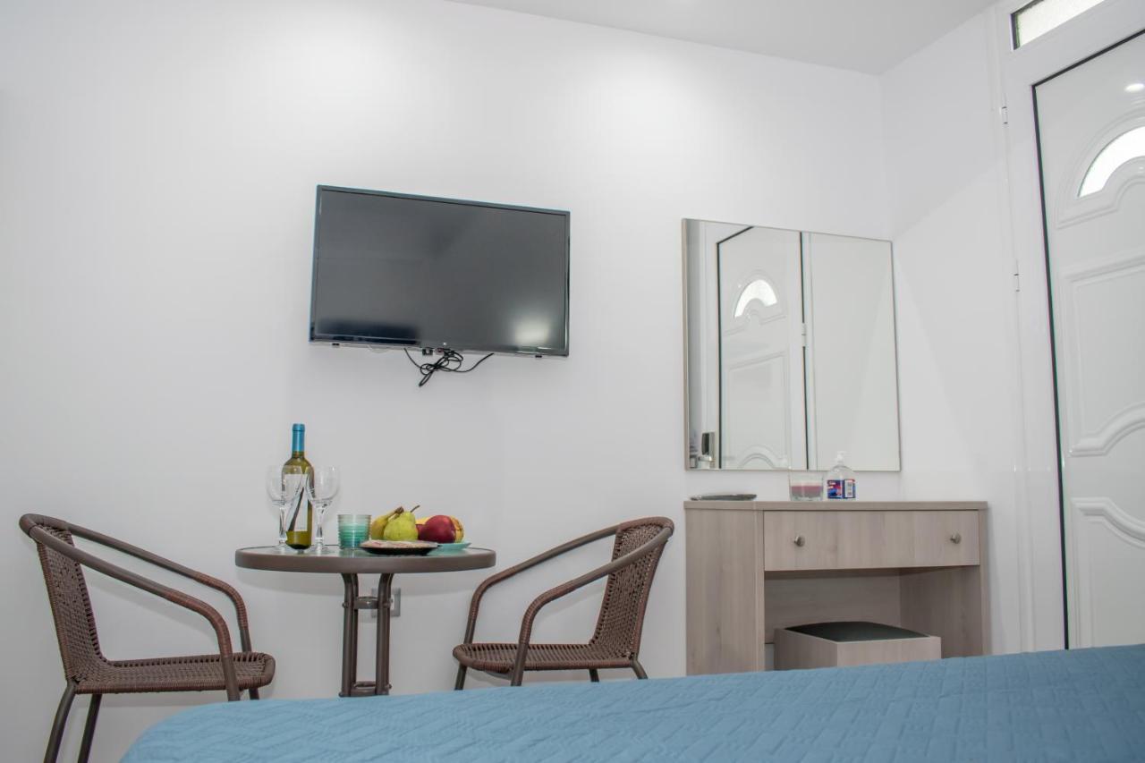 Red Hibiscus Stegna Guest House Archangelos  Exterior foto